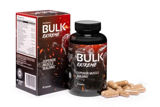 Close-up of Bulk Extreme supplement bottle and box on a soft cloth.